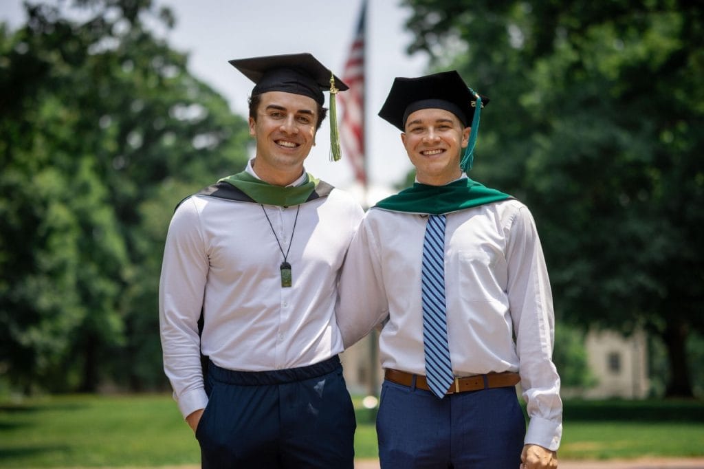 Two UNC student standing together posing for a portrait in their Graduation Photo Session with Amelia and Matt Photo in Chapel Hill North Carolina