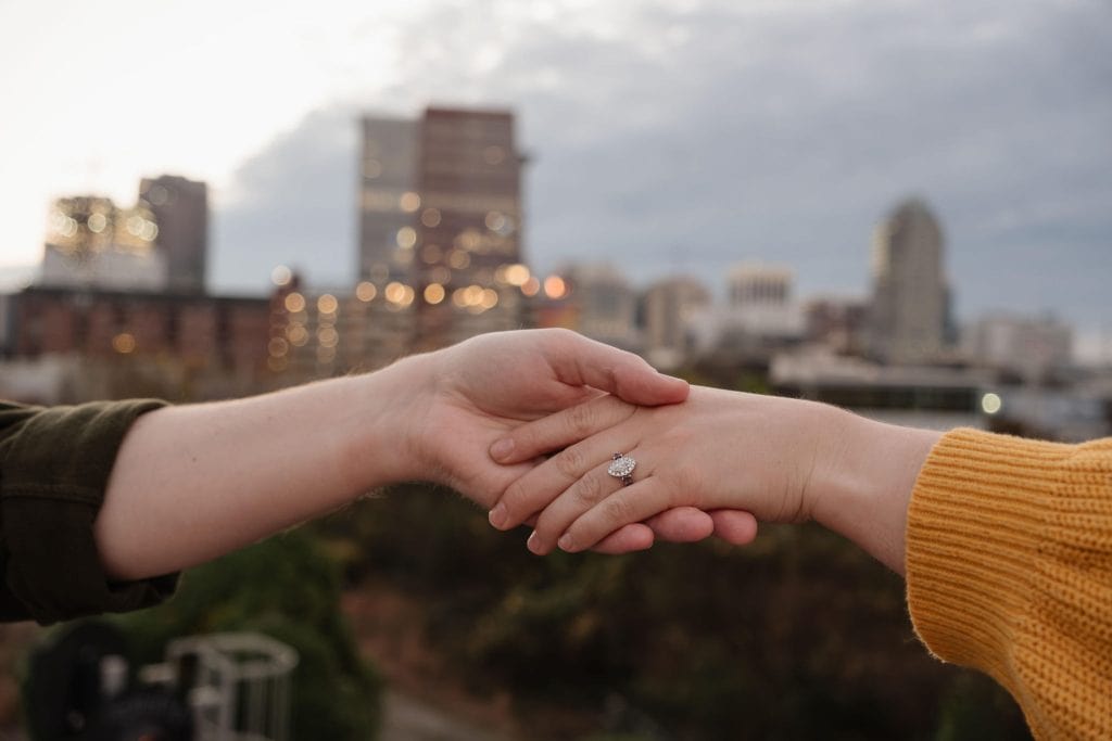 Close Up of Engagement Ring in Engagement Session in Downtown Raleigh NC - Amelia and Matt Photo