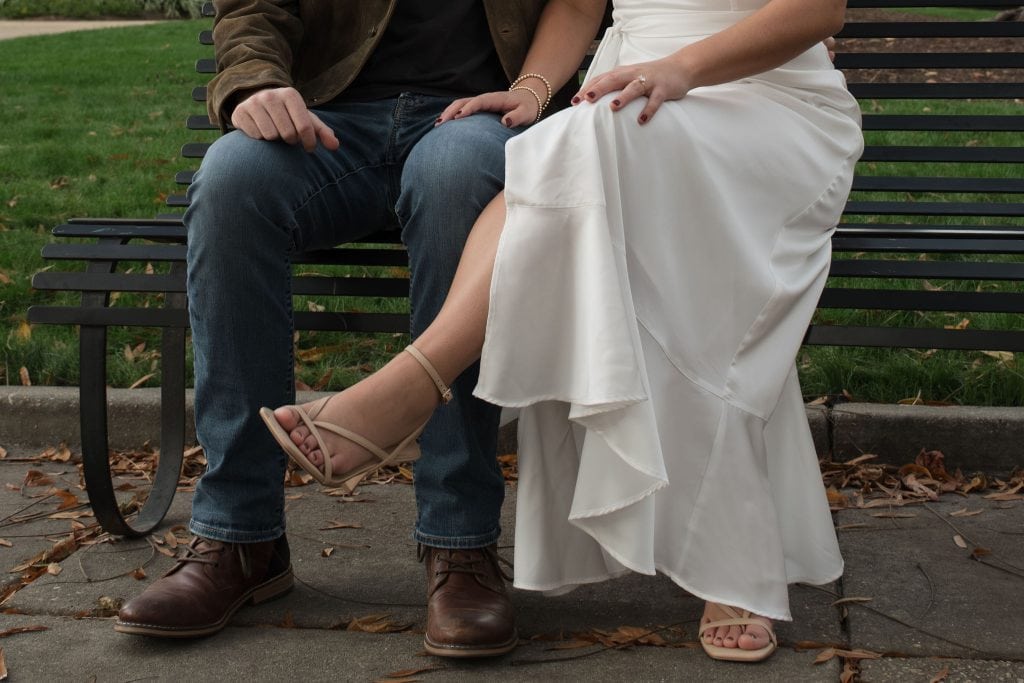 Close up of couples shoes during engagement session in Downtown Raleigh NC