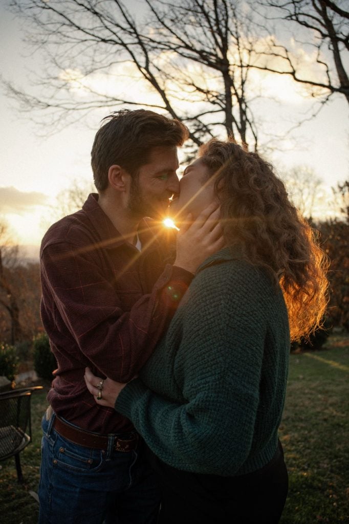 Couple Kissing in front of the sunset in Gideon Ridge NC - NC Mountains Couple Photography Session