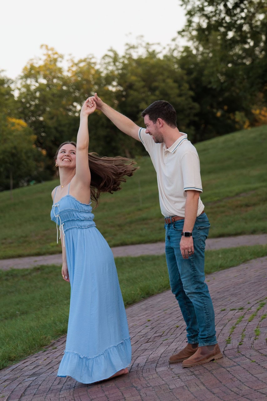 couple dancing and happy during their couples session